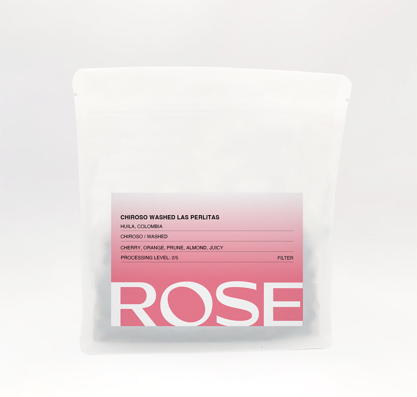 Rose Chiroso Washed Las Perlitas coffee bag with pink label on a light background